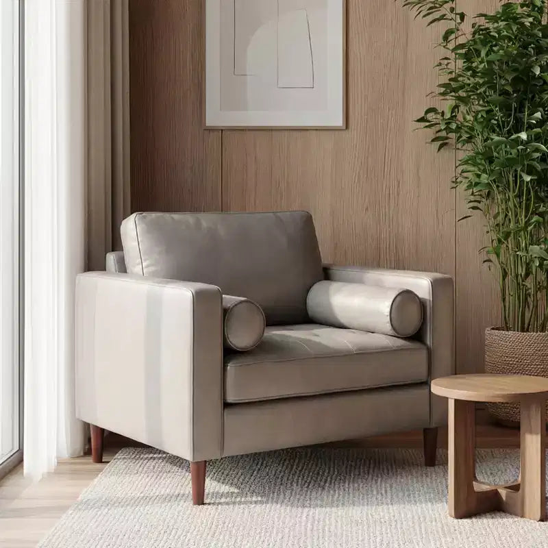 Fauteuil club capitonné contemporain en similicuir  avec traversins