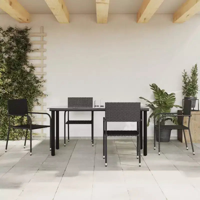 vidaXL Ensemble de jardin à manger noir résine tressée et acier empilable standard - Longueur de table 63 4 articles