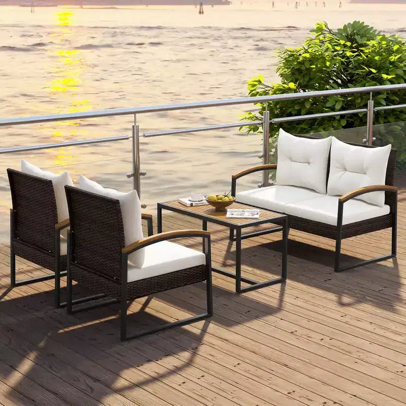 Ensemble de conversation de patio 4 pièces Costway avec table basse et accoudoirs en bois d'acacia massif