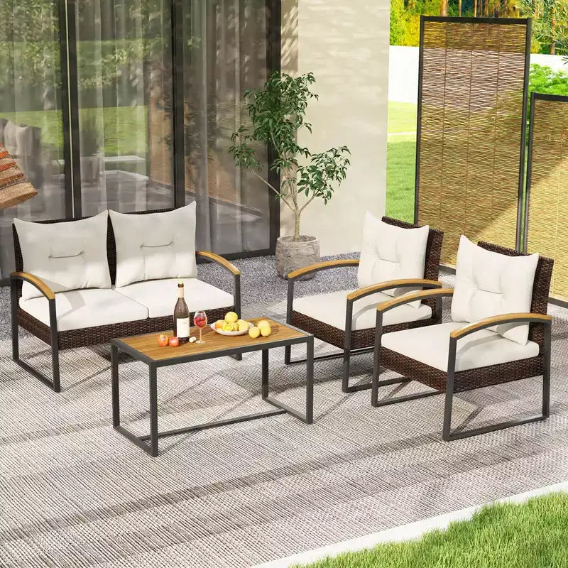 Ensemble de conversation de patio 4 pièces Costway avec table basse et accoudoirs en bois d'acacia massif