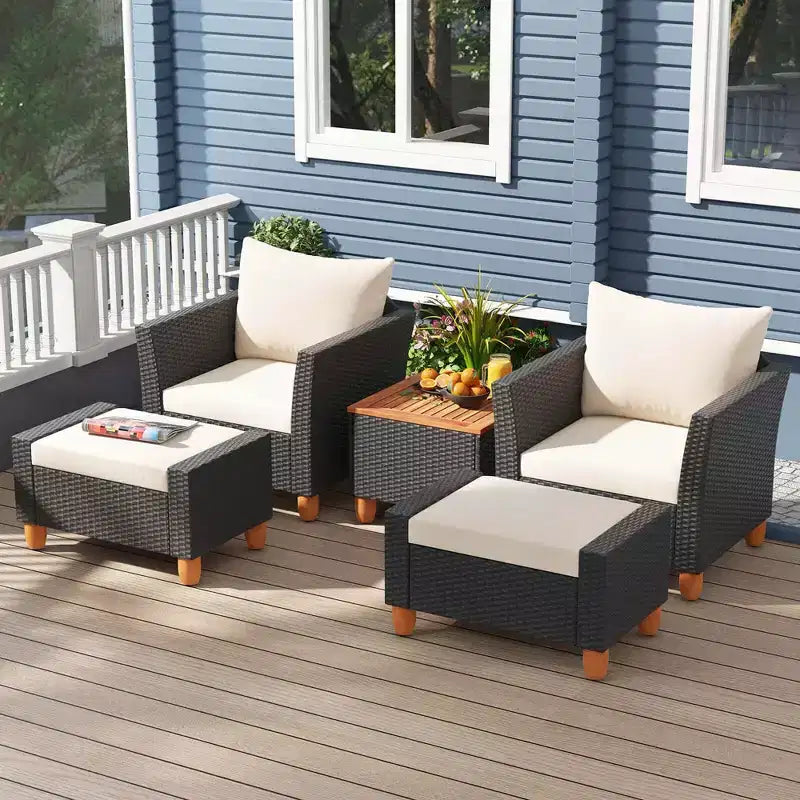 Ensemble de mobilier de patio Costway 5 pièces avec table de rangement, poufs, oreillers et coussins moelleux