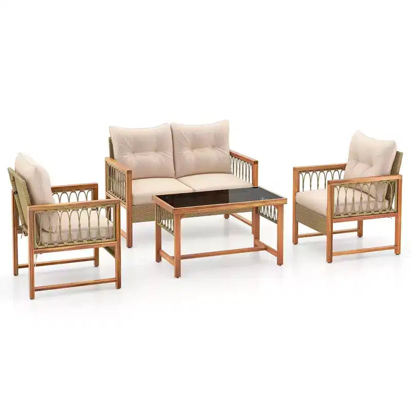Ensemble de mobilier de patio Costway 4 pièces avec cadre en bois d'acacia, coussins et table basse