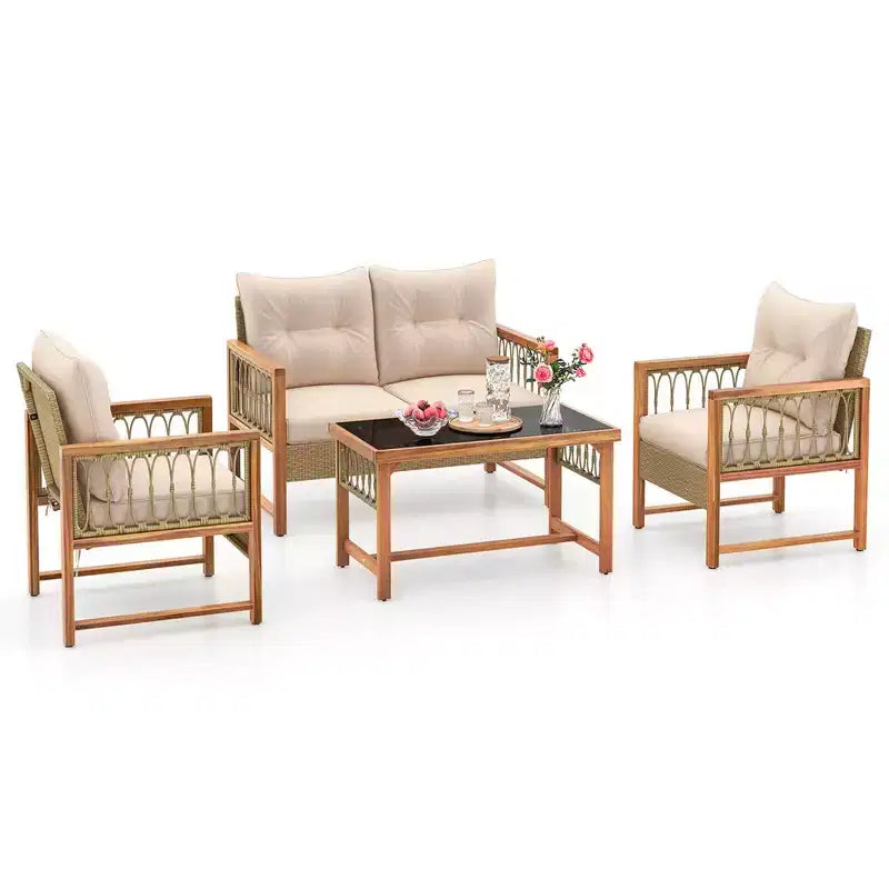 Ensemble de mobilier de patio Costway 4 pièces avec cadre en bois d'acacia, coussins et table basse